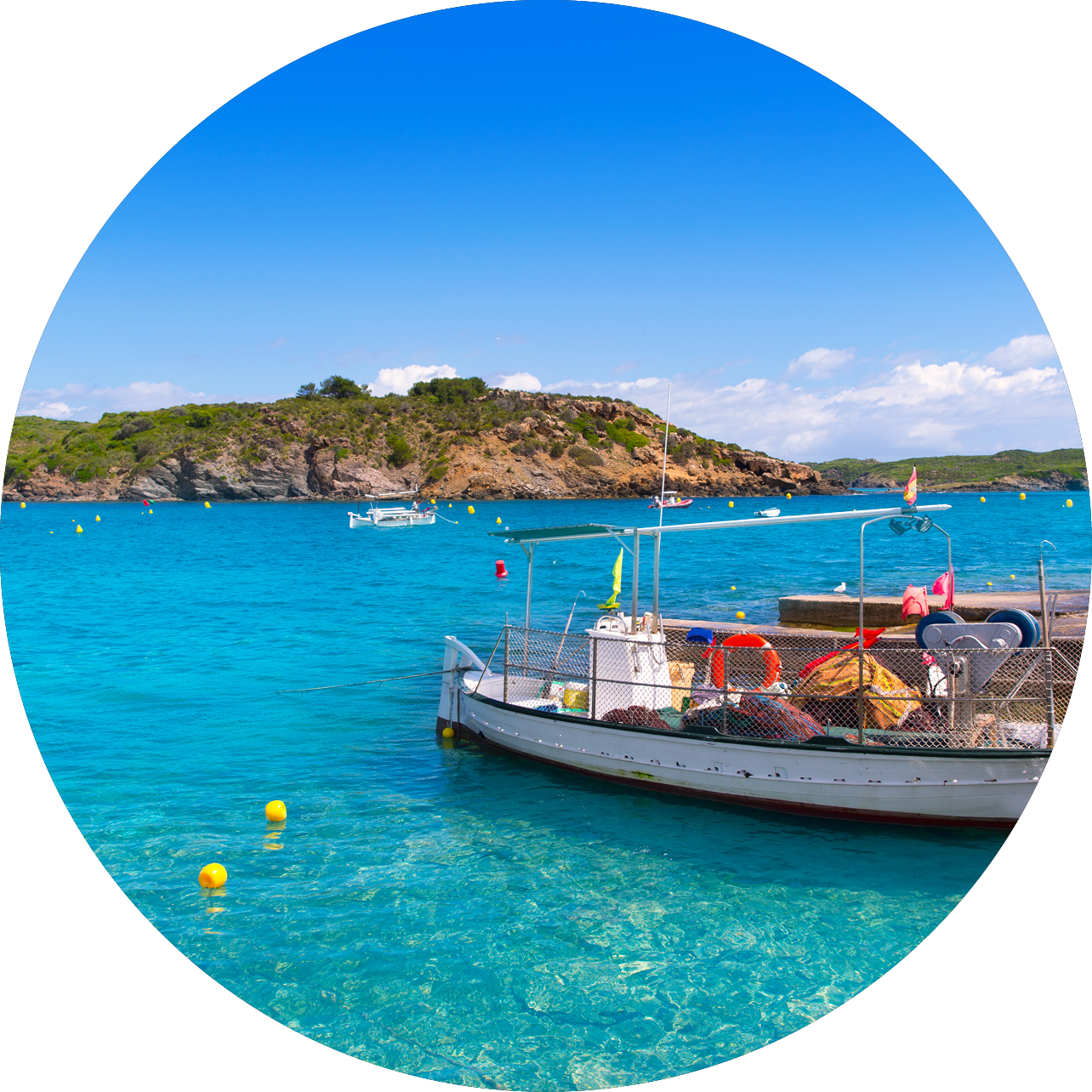 Menorca Es Grau clean port with llaut boats in Balearic Islands
