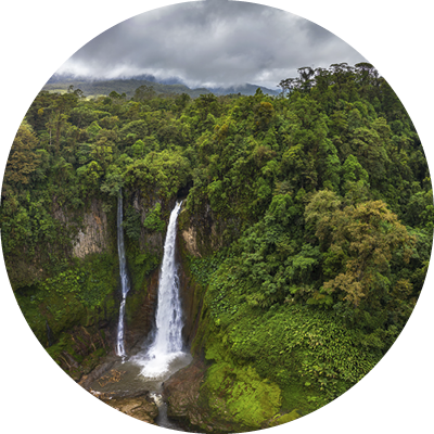 Aerial view of the Catarata del Toro waterfall in Costa Rica with surrounding mountains. This waterfall is located in Juan Castro Blanco National Park on the Toro Amarillo River and is 90m high.