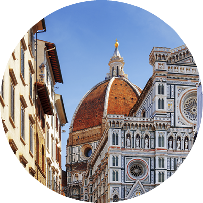 The Cathedral of Saint Mary of the Flower (Florence Cathedral) at historic center of Florence, Tuscany, Italy. View from the Piazza San Giovanni. Dome on blue sky background.