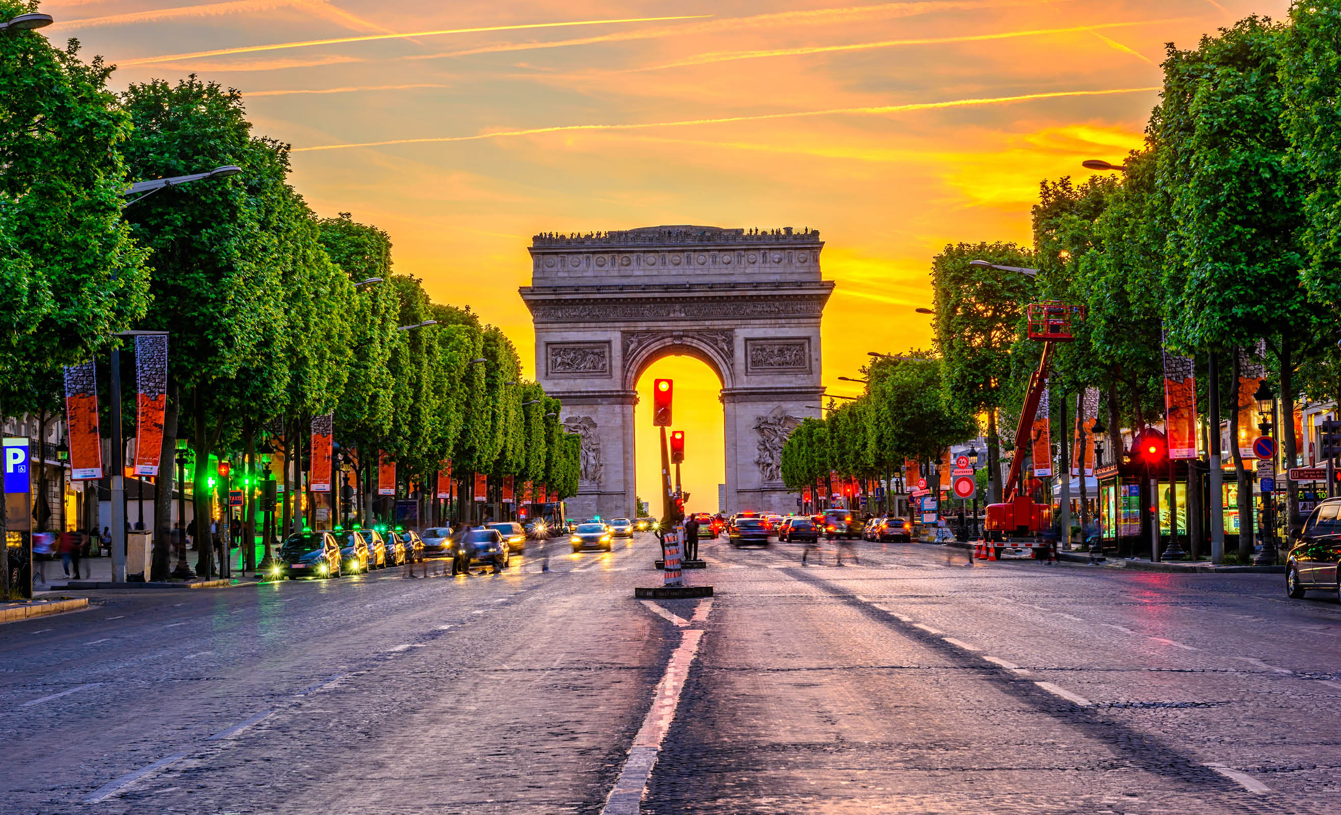 Champs-Elysees and Arc de Triomphe at night in Paris, France. Architecture and landmarks of Paris. Postcard of Paris