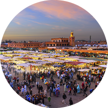 Famous Djemaa El Fna Square in early evening light, Marrakech, Morocco with the Koutoubia Mosque, Northern Africa.Nikon D3x